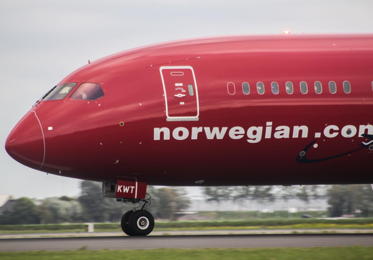 Can I talk to a real person at Norwegian Airlines?